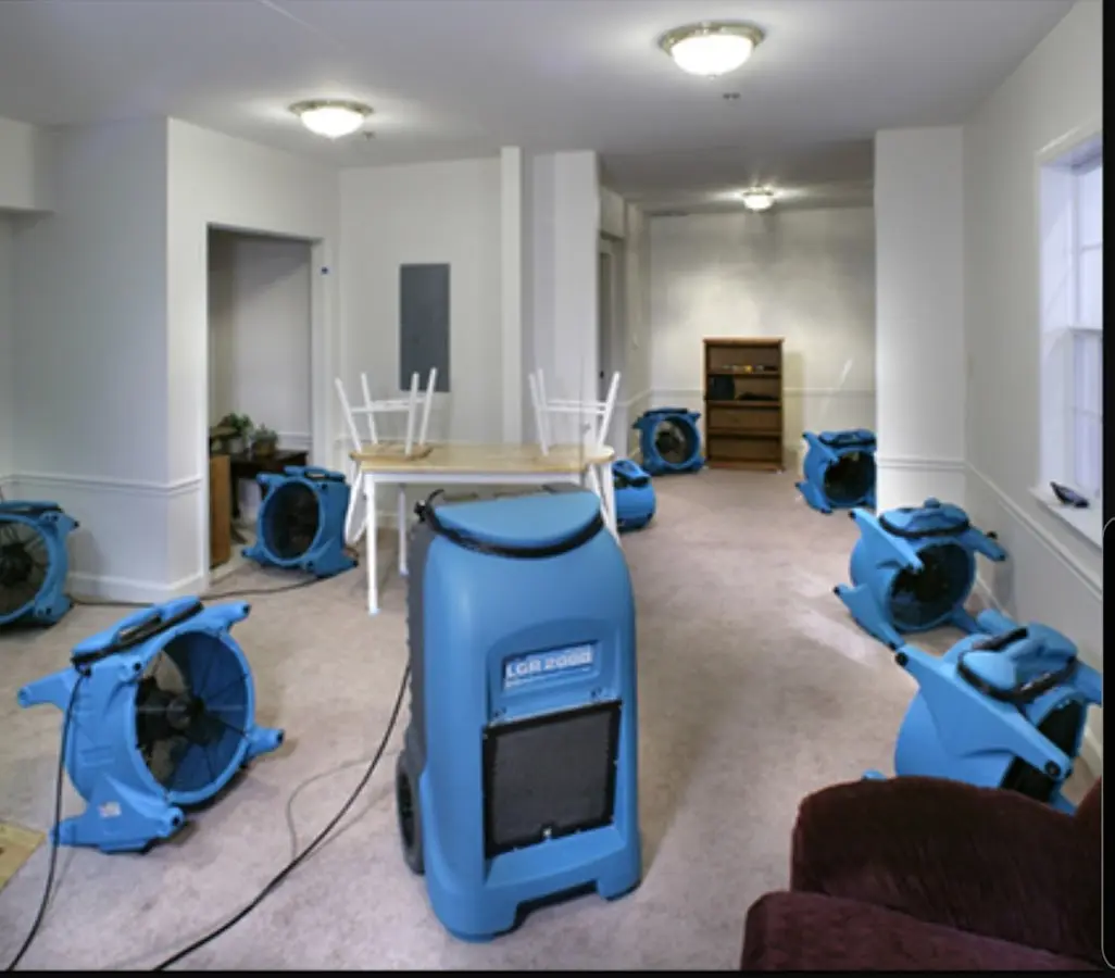Air movers and dehumidifier setup for Water Damage Restoration in Milledgeville