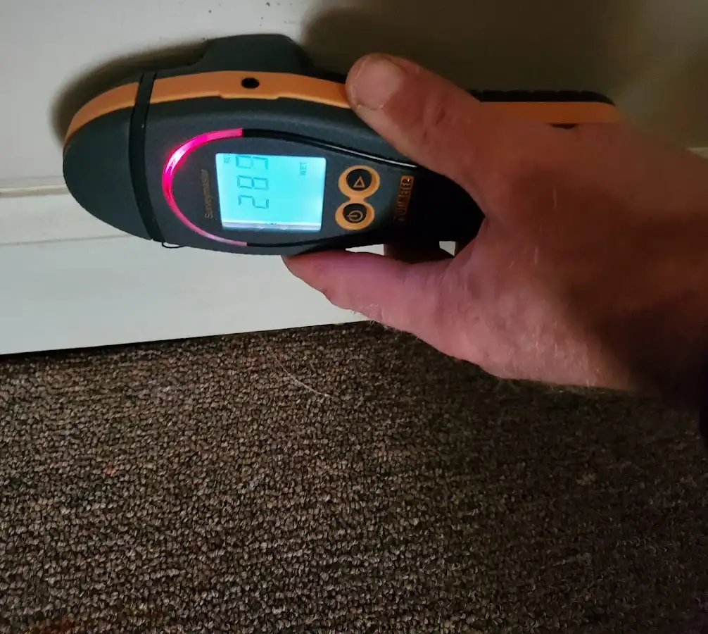 Moisture detection at baseboard during Burst Pipe Cleanup in Milledgeville